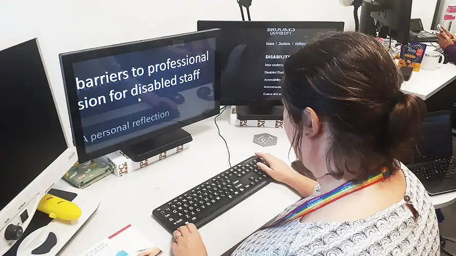 A woman using SuperNova on her office PC.